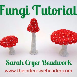 May include: Three beaded mushroom sculptures with red caps and white spots, atop white stems. The text "Fungi Tutorial" is in green above the mushrooms, and "Sarah Cryer Beadwork" is below. The website address is also visible.