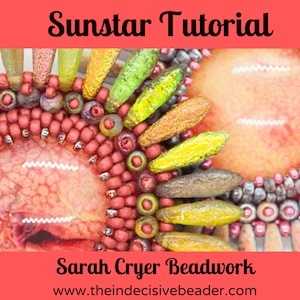 May include: Close-up of a beaded sunstar design with a red, orange, yellow, and green color scheme. The beads are arranged in a circular pattern, creating a sunburst effect. The design is intricate and detailed, with a variety of different bead shapes and sizes. The text "Sunstar Tutorial" and "Sarah Cryer Beadwork" is visible at the top and bottom of the image.