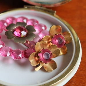 Art Deco Early Plastic Pin with Pink Molded Rhinestones in a Flower Design with Matching Earrings