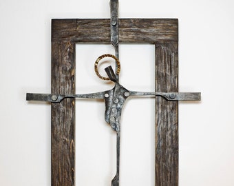 Crucifixion. Wall sculpture. Religious sculpture.