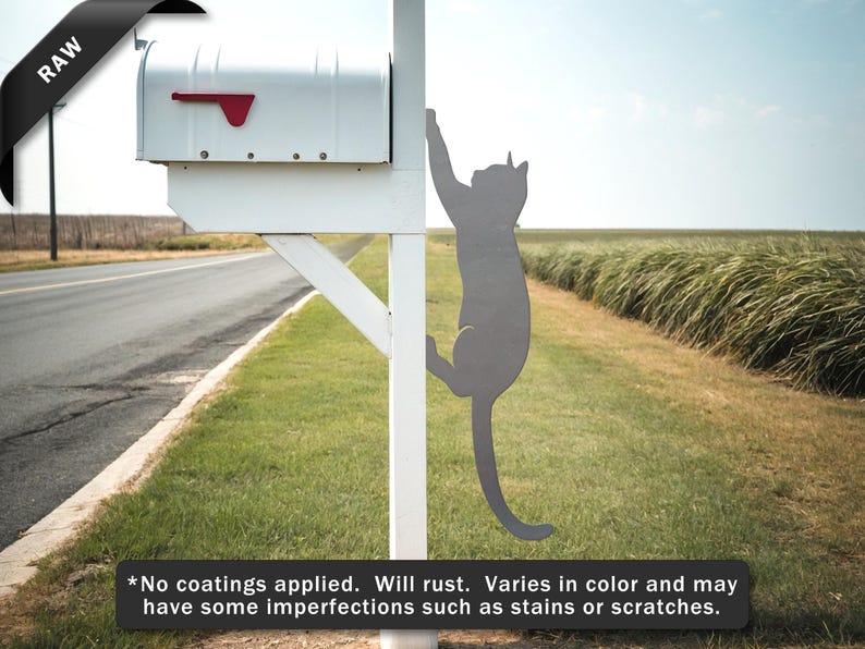 Shows a raw metal cat climbing a mailbox post.