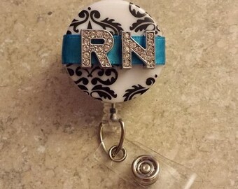 Damask Retractable Badge Holder: Rhinestone RN, Turquoise Ribbon