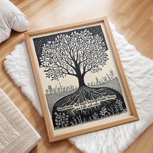 May include: Framed art print featuring a black and white tree illustration with intricate details. The artwork includes a quote: "Sometimes, the most unforgettable things are felt, not seen." The print is set in a natural wood frame.