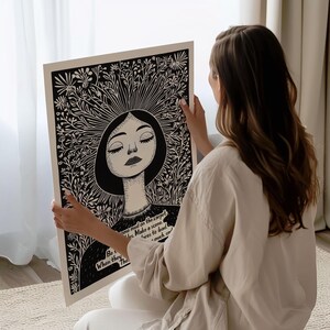 May include: Black and white illustration of a woman with closed eyes surrounded by flowers. The text "Be true when they are much, much smaller" is printed below the image.