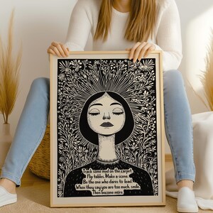 May include: Black and white illustration of a woman with flowers growing from her head. The text reads: "Track some mud on the carpet. Flip tables. Make a scene. Be the one who dares to lead. When they say you are too much, smile. Then become more."