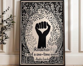 May include: Black and white illustration of a raised fist surrounded by stylized foliage. The text "Revolution is not a one-time event -Audre Lorde" is below the fist.