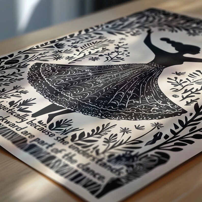 May include: Black and white art print featuring a silhouette of a woman dancing, surrounded by floral and leaf designs. The woman is wearing a detailed dress. The print includes text that reads, "...energetically because she understands..."