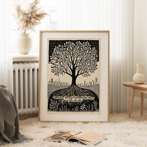May include: A framed art print featuring a black and white tree illustration with intricate details. The tree's roots are visible, and the artwork includes the text: "Sometimes, the most unforgettable things are felt, not seen."