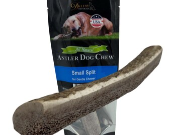 May include: A split deer antler dog chew positioned in front of a black, blue, and white product pouch labeled Deluxe Naturals Antler Dog Chew Small Split for Gentle Chewer with a graphic of a dog and a Product of USA circular emblem.