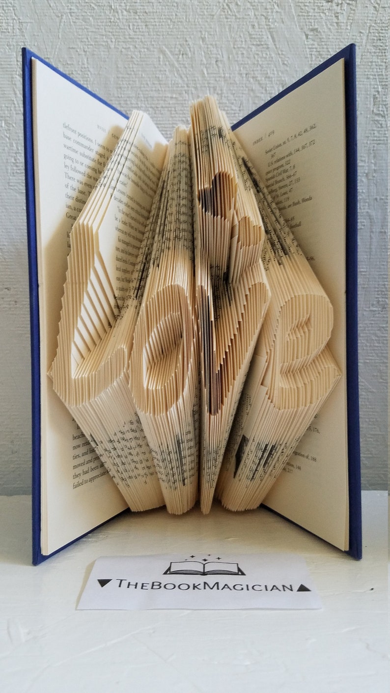 A unique art crafted by carefully folding each individual page of a used book as a Valentines gift for him