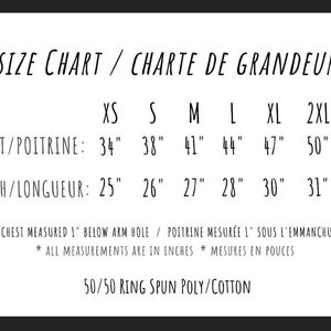 May include: Size chart for a shirt with measurements in inches for chest and length. The chart includes sizes XS, S, M, L, XL, and 2XL. The text "Chest measured 1" below arm hole / Poitrine mesur&eacute;e 1" sous l'emmanchure" is included. The text "* All measurements are in inches * Mesures en pouces" is included. The text "50/50 Ring Spun Poly/Cotton" is included.