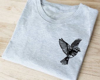 T-shirt oiseau UNISEXE, chandail oiseau noir graphique, illustration moineau noir linogravure fait main, chandail printemps, mode éthique