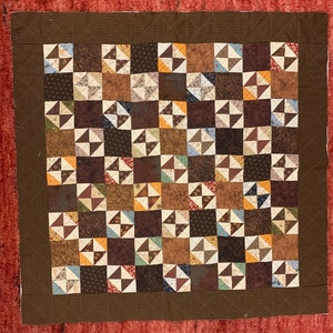 Quilted bow tie design to be finished  27&quot; square