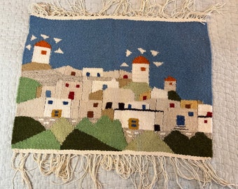 Weaving of a Greek village tapestry