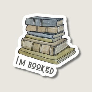 May include: A sticker with a stack of watercolor painted books and the text "I'm Booked".