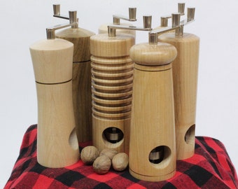 Unique Wooden nutmeg mill. Easily grate fresh whole nutmeg without risk to fingers