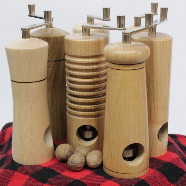 Unique Wooden nutmeg mill. Easily grate fresh whole nutmeg without risk to fingers