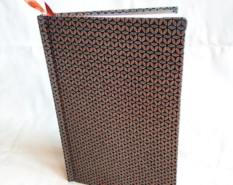 Inspiring quotes and unique fabric make this hard-cover journal special
