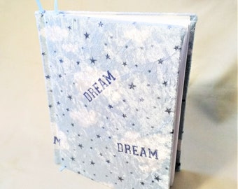 SOLD! DREAM is the theme of this soft feeling , hard cover 9"x 7" journal