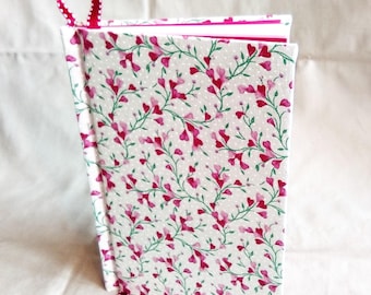 Tiny hearts on vine cover pink pages and friendship quotes