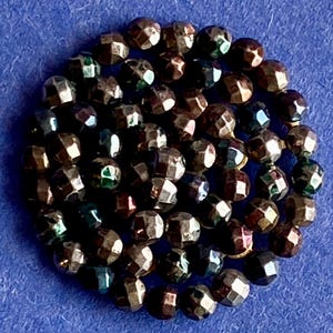 Unique ANTIQUE CUT STEEL Button
