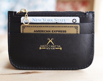 Cartera con cremallera de cuero negro