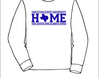 May include: White long-sleeved top with the blue text "TARLETON STATE UNIVERSITY HOME THE GATES ARE ALWAYS OPEN". The word "HOME" includes a blue outline of the state of Texas.