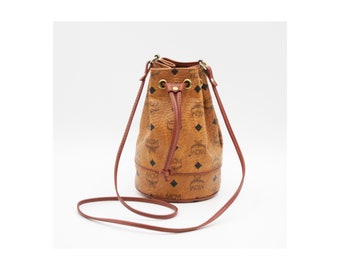 Mcm mini sling bag sales