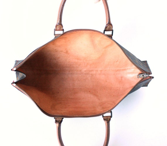 VERIFIED Louis Vuitton Monogram Triangle Sac Bag -  Finland