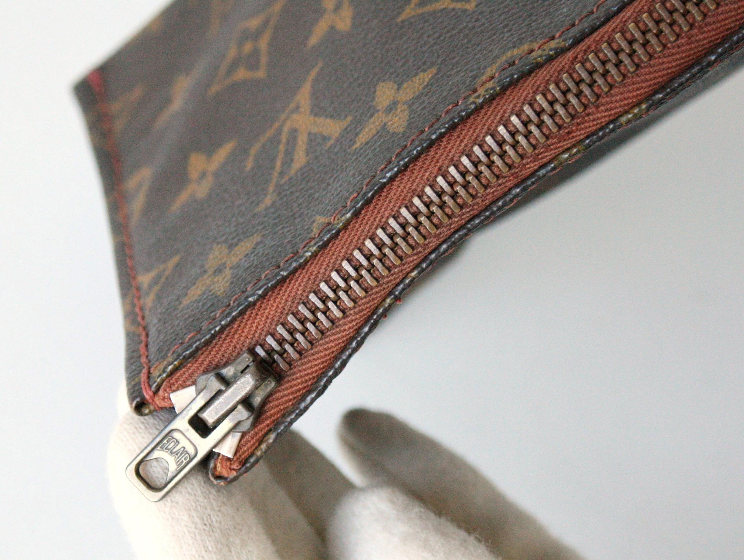 Louis Vuitton  Authentic Vintage Monogram Sac Triangle Bag