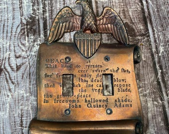 Tapa de interruptor de luz metálica vintage de los años 60 con forma de águila, tapa de interruptor de luz de John Quincy Adam