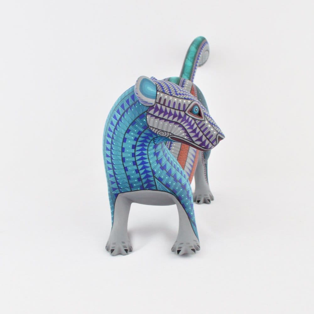 手彫りのコパル材製カワウソのアレブリヘ｜手描きのメキシコ民芸彫刻