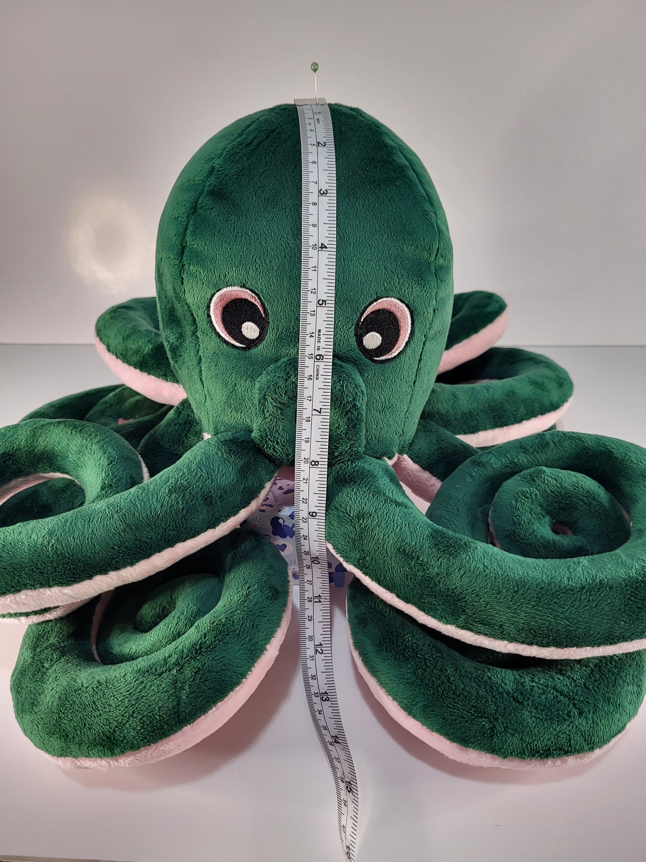 Green octopus toy sale