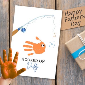 Manualidad de pez con huella de mano: regalo para el Día del Padre, recuerdo de los niños, arte de "Hooked on Daddy" para papá