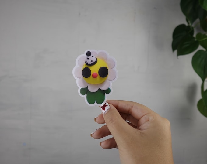 Lil button guy sticker