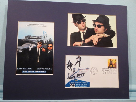 Dan Aykroyd and John Belushi as the Blues Brothers and the First