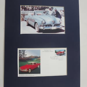 May include: A matted display featuring two images of a 1953 Studebaker Starliner. The top image shows a light blue convertible with the text STUDEBAKER on the side. The bottom image includes a red coupe, a postage stamp, and text about the car.