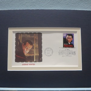 May include: A white envelope with a commemorative stamp featuring Bela Lugosi as Dracula from the Universal Studios film. The stamp is part of a series celebrating Legendary Monsters. The envelope is dated September 10, 1997.
