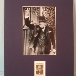 Prime Minister Winston Churchill and World War II Leader flashes the famous V for Victory Sign honored by his own stamp