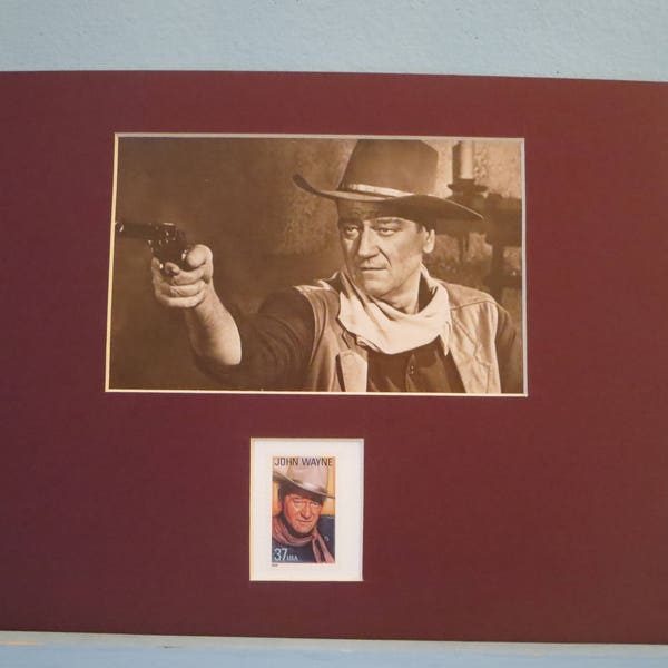 Western Movie star = John Wayne  honored by his own stamp