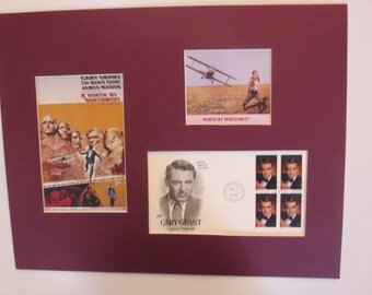 Cary Grant och Eva Marie Saint i North by Northwest regisserad av Alfred Hitchcock och första dagens omslag till Cary Grant-frimärket