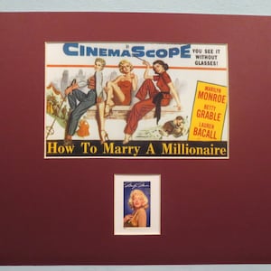Marilyn Monroe in&quot;How to Marry a Millionaire&quot; with Lauren Bacall and Betty Grable honored by the Marilyn Monroe stamp