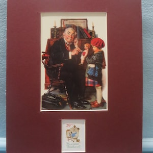 Norman Rockwell&#39;s The Doctors and the Doll and the stamp issued for Norman Rockwell