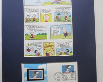 Peanuts featuring Football - Charlie Brown  and Lucy & the First Day Cover of the Snoopy stamp