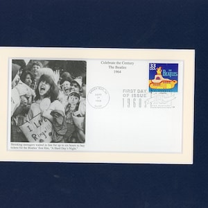 The Beatles and the First day Cover for the Yellow Submarine stamp