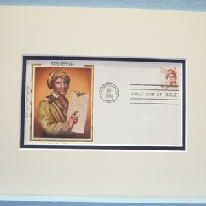 May include: A first day of issue envelope for the 1980 US Postal Service stamp honoring Sequoyah, the inventor of the Cherokee syllabary. The envelope features a portrait of Sequoyah holding a page of his syllabary. The envelope is dated December 27, 1980, and has a "First Day of Issue" postmark.