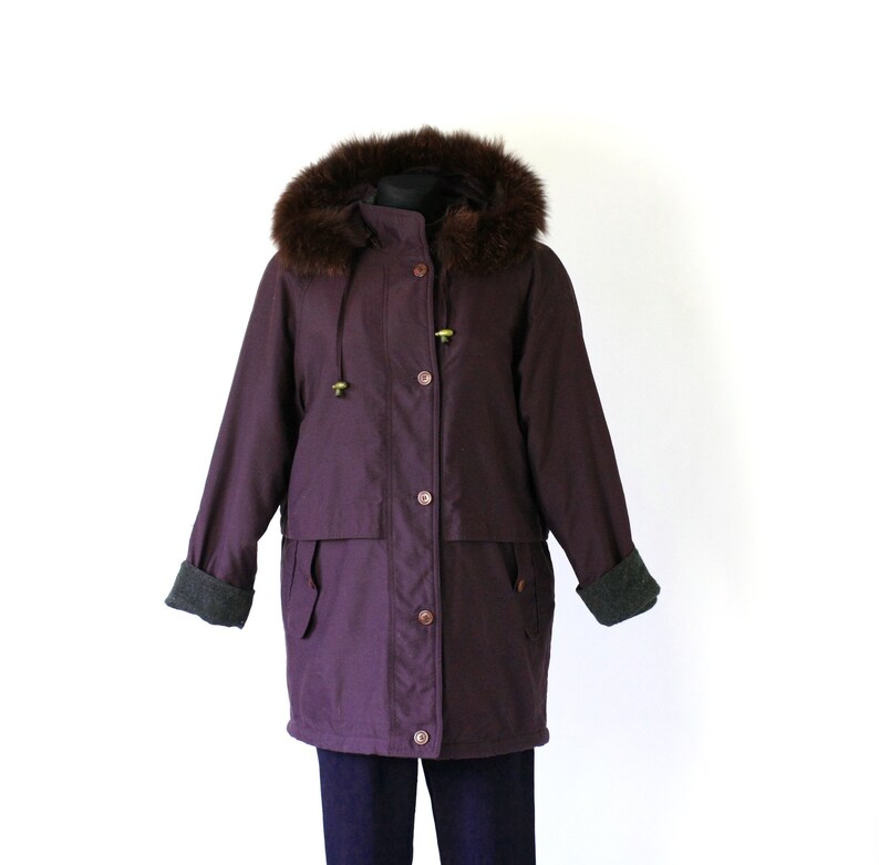Arreglo parkas de pluma Clearance