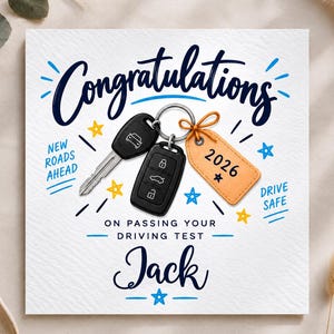 May include: A square greeting card featuring the text Congratulations on passing your driving test Jack. The design includes a metal key ring with a car key, a key fob, and an orange tag labeled 2026, surrounded by blue and yellow star icons.