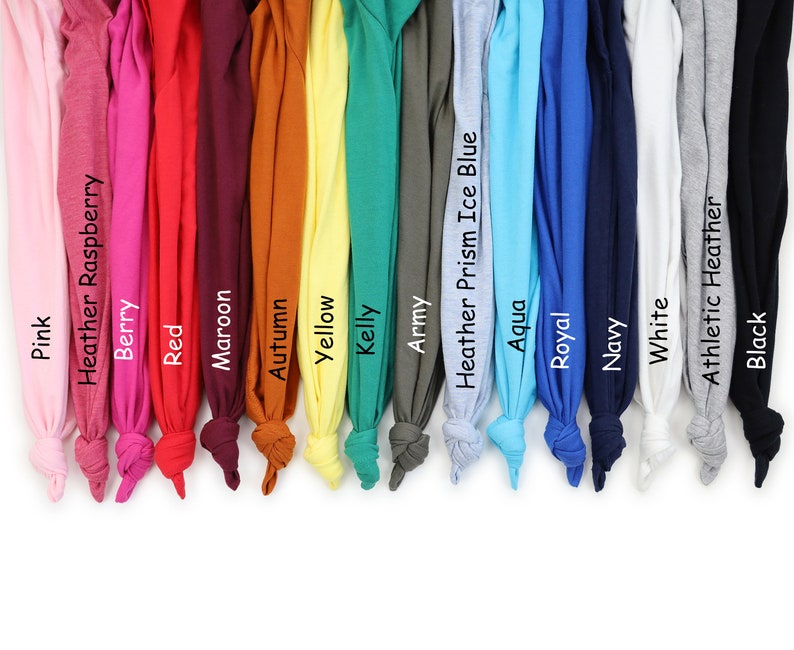 K&ouml;nnte beinhalten: Eine Auswahl an T-Shirt-Farben, darunter Pink, Rot, Maroon, Gelb, Kellygr&uuml;n, Armeegr&uuml;n, Aqua, Royalblau, Marineblau, Wei&szlig;, Sportgrau und Schwarz.