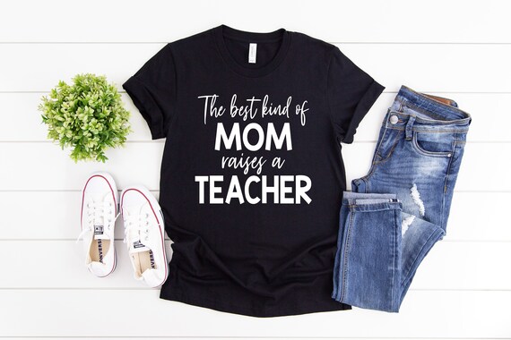 The Best Kind Of Mom Raises A Teacher Flower T-Shirt The Best Kind Of Mom Raises A Teacher Flower T-Shirt